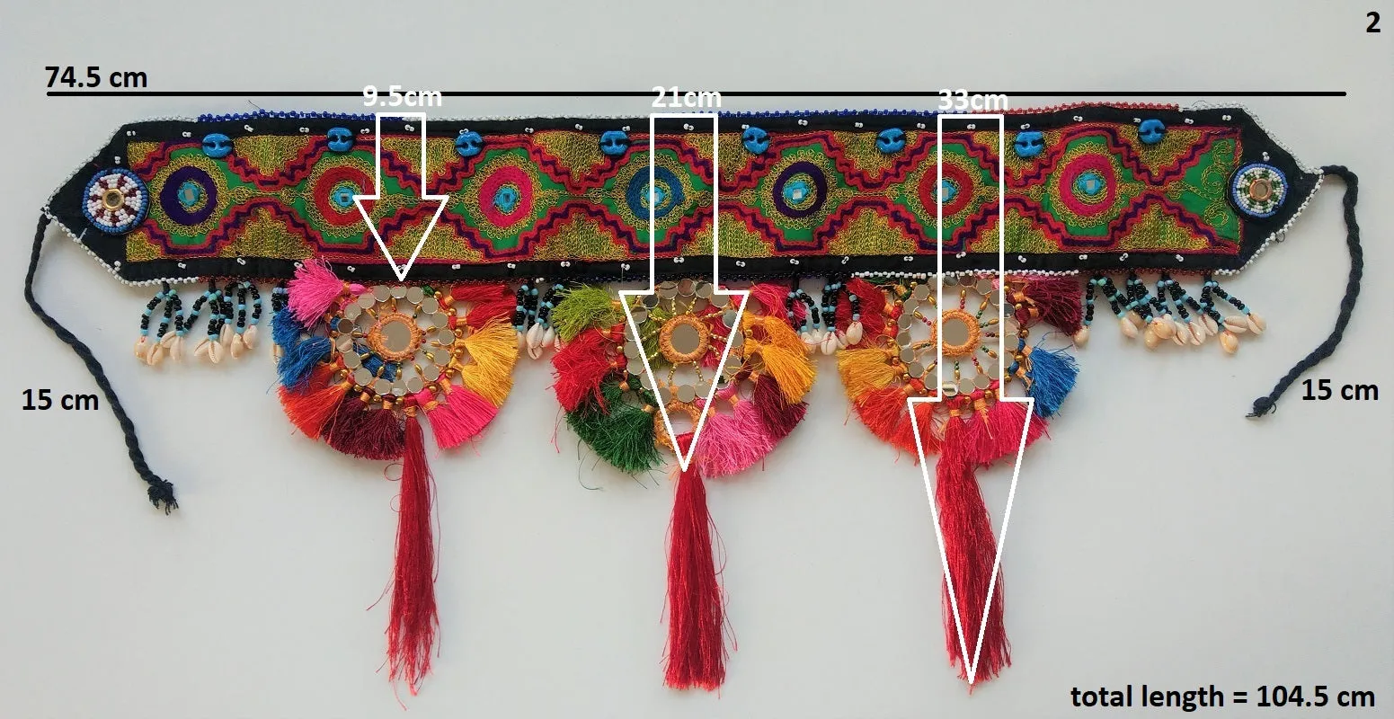 Embroidered Kuchi tassel belt with natural cowrie shells, colorful sun medallions and tribal tassels