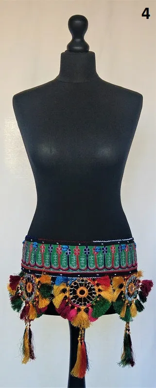 Embroidered Kuchi tassel belt with natural cowrie shells, colorful sun medallions and tribal tassels