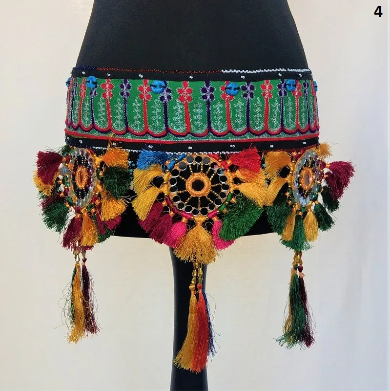 Embroidered Kuchi tassel belt with natural cowrie shells, colorful sun medallions and tribal tassels