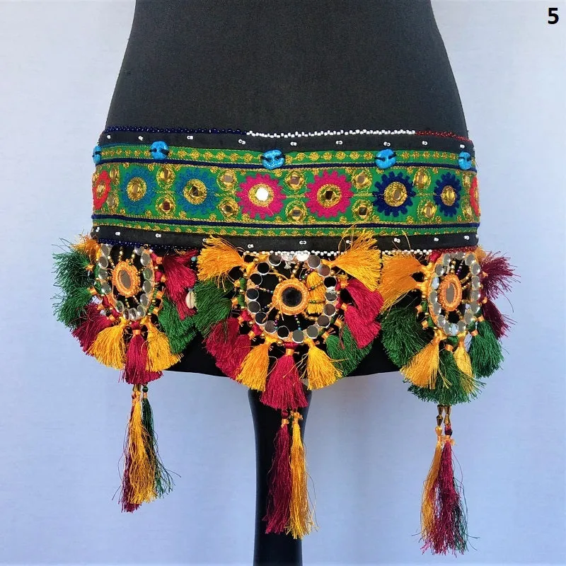 Embroidered Kuchi tassel belt with natural cowrie shells, colorful sun medallions and tribal tassels