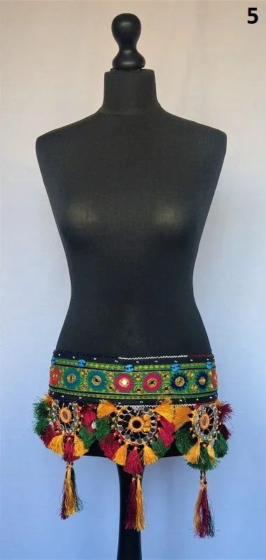 Embroidered Kuchi tassel belt with natural cowrie shells, colorful sun medallions and tribal tassels