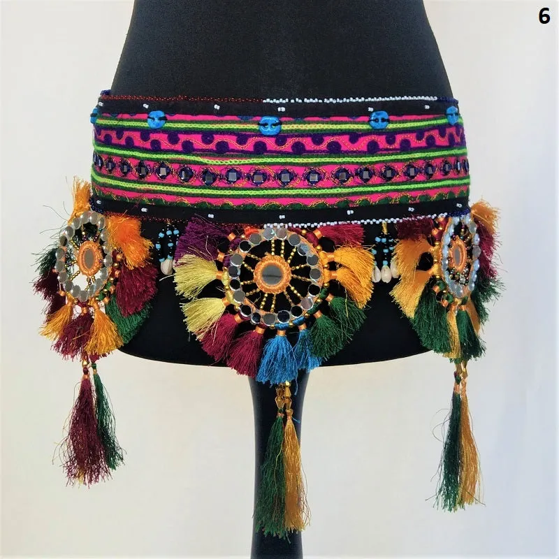 Embroidered Kuchi tassel belt with natural cowrie shells, colorful sun medallions and tribal tassels