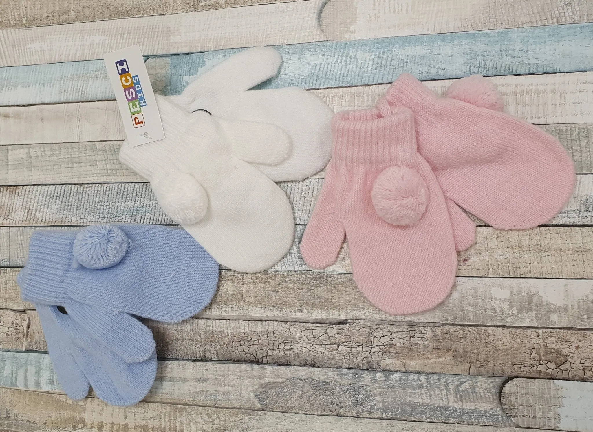 Knitted Baby Mittens With Pom Pom