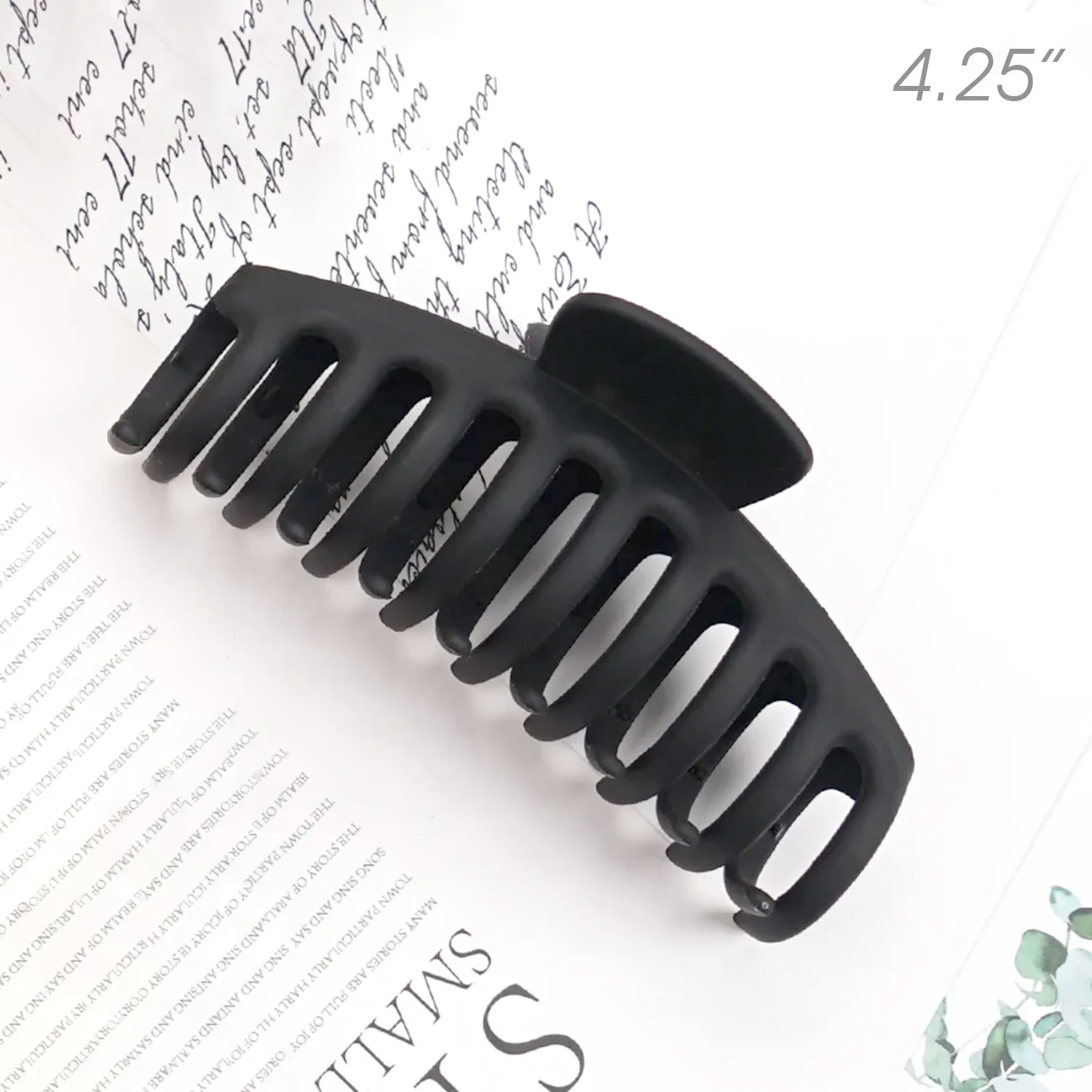 Medium Black Matte Sausage Shape Plastic Hair Claw