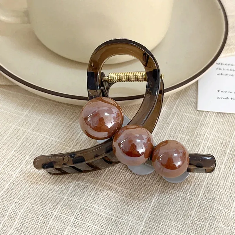 Pearl Crossing Hair Claw