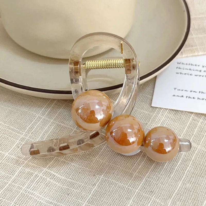 Pearl Crossing Hair Claw