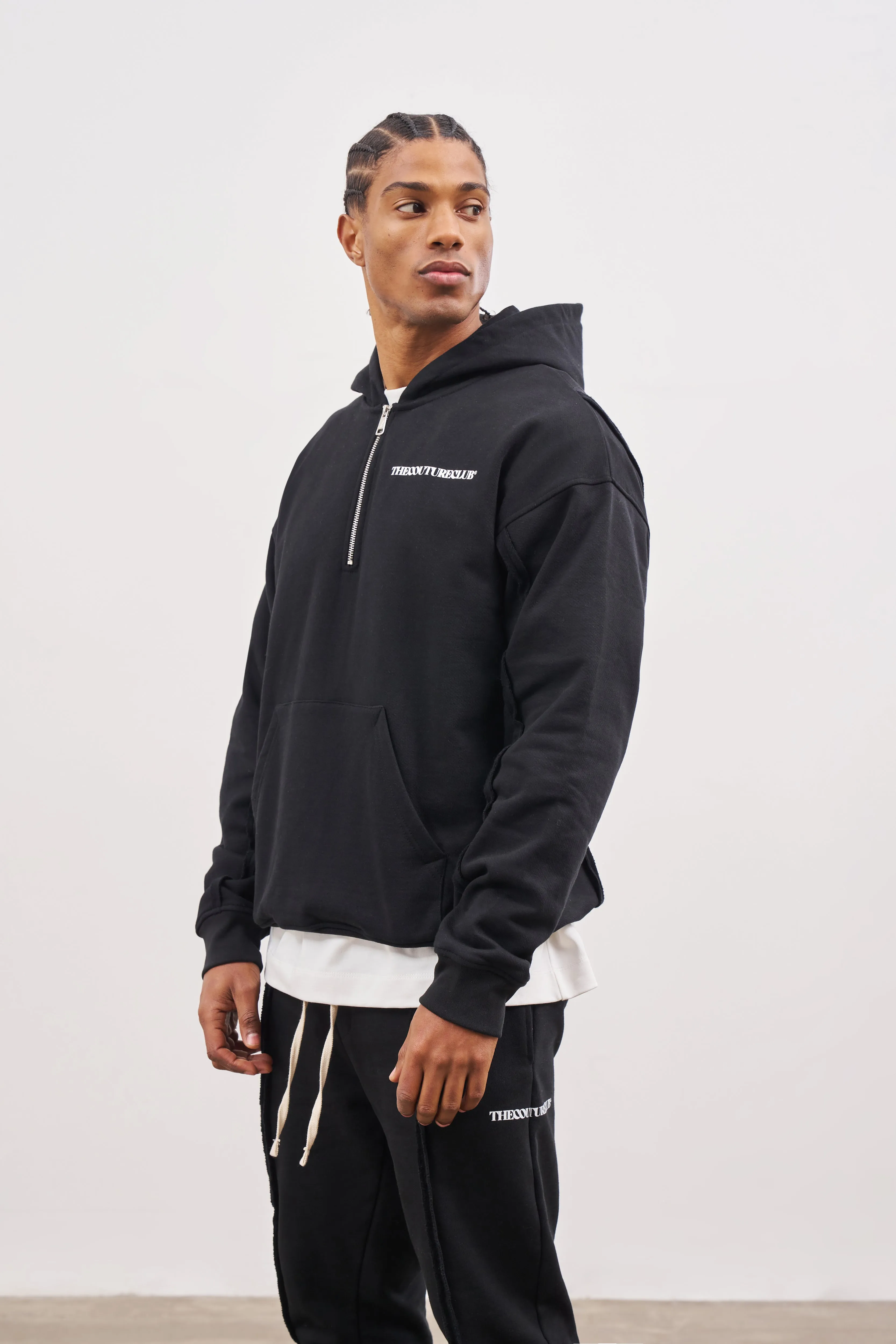 RAW SEAM QUARTER ZIP HOODIE - BLACK