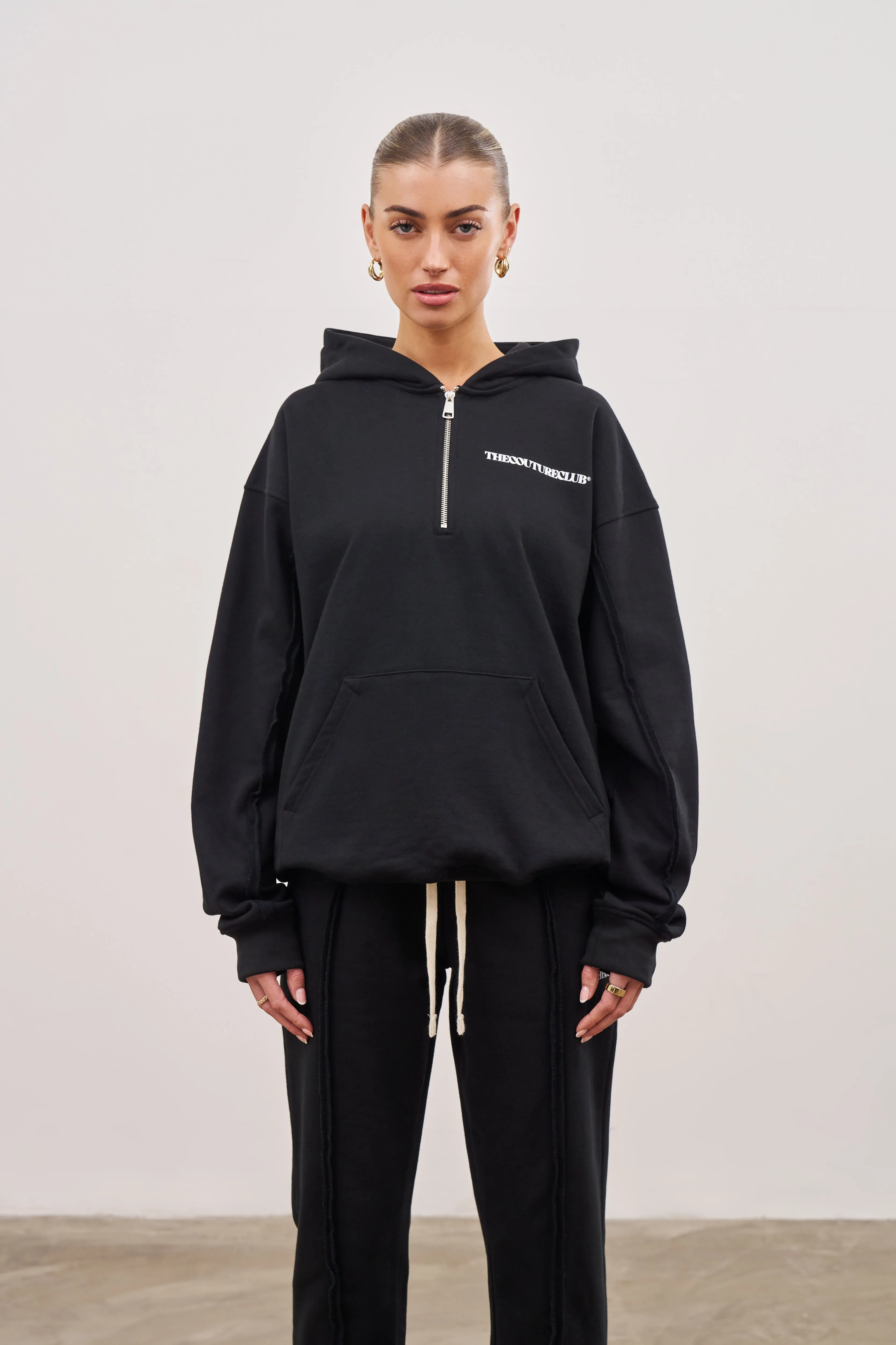 RAW SEAM QUARTER ZIP HOODIE - BLACK