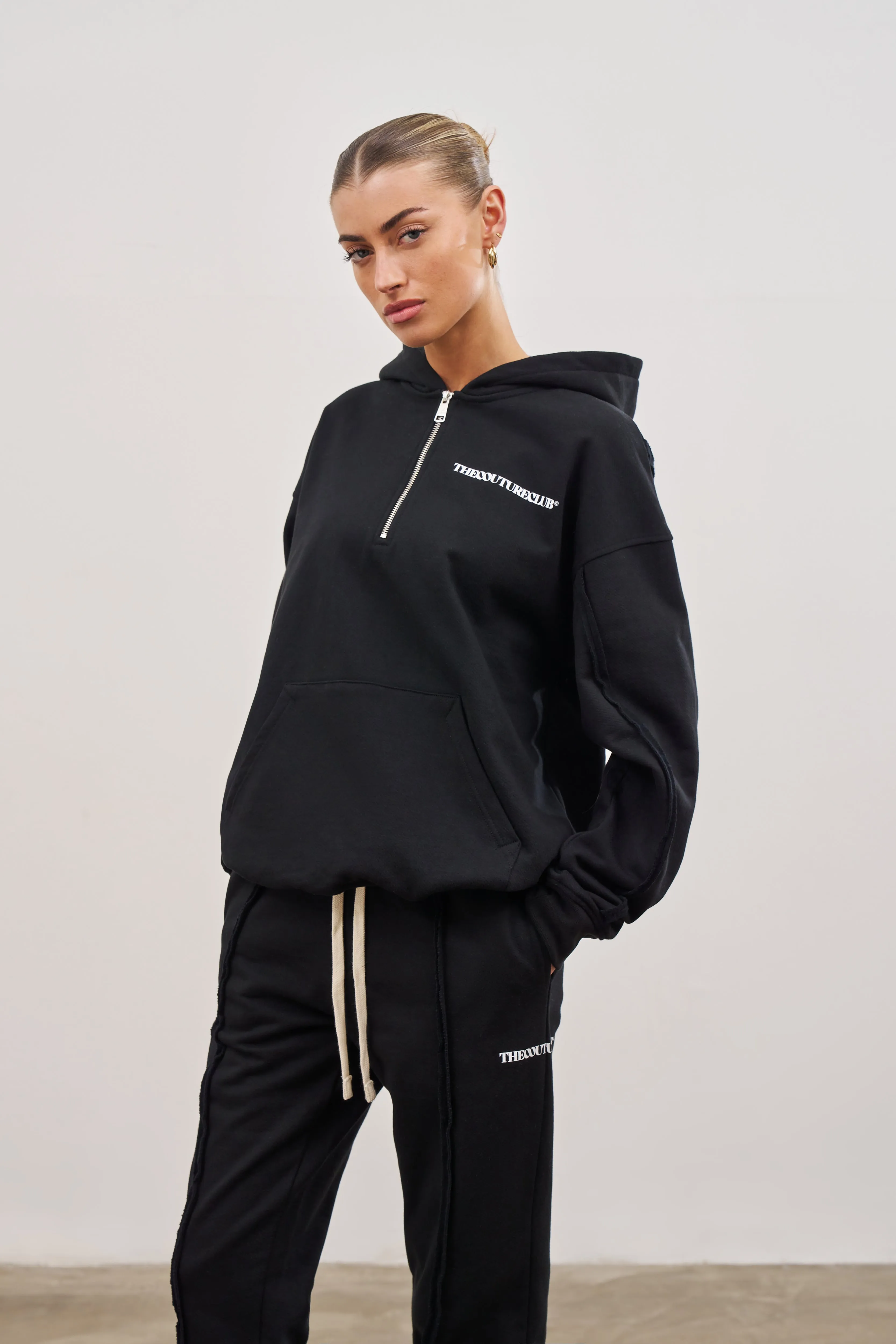 RAW SEAM QUARTER ZIP HOODIE - BLACK