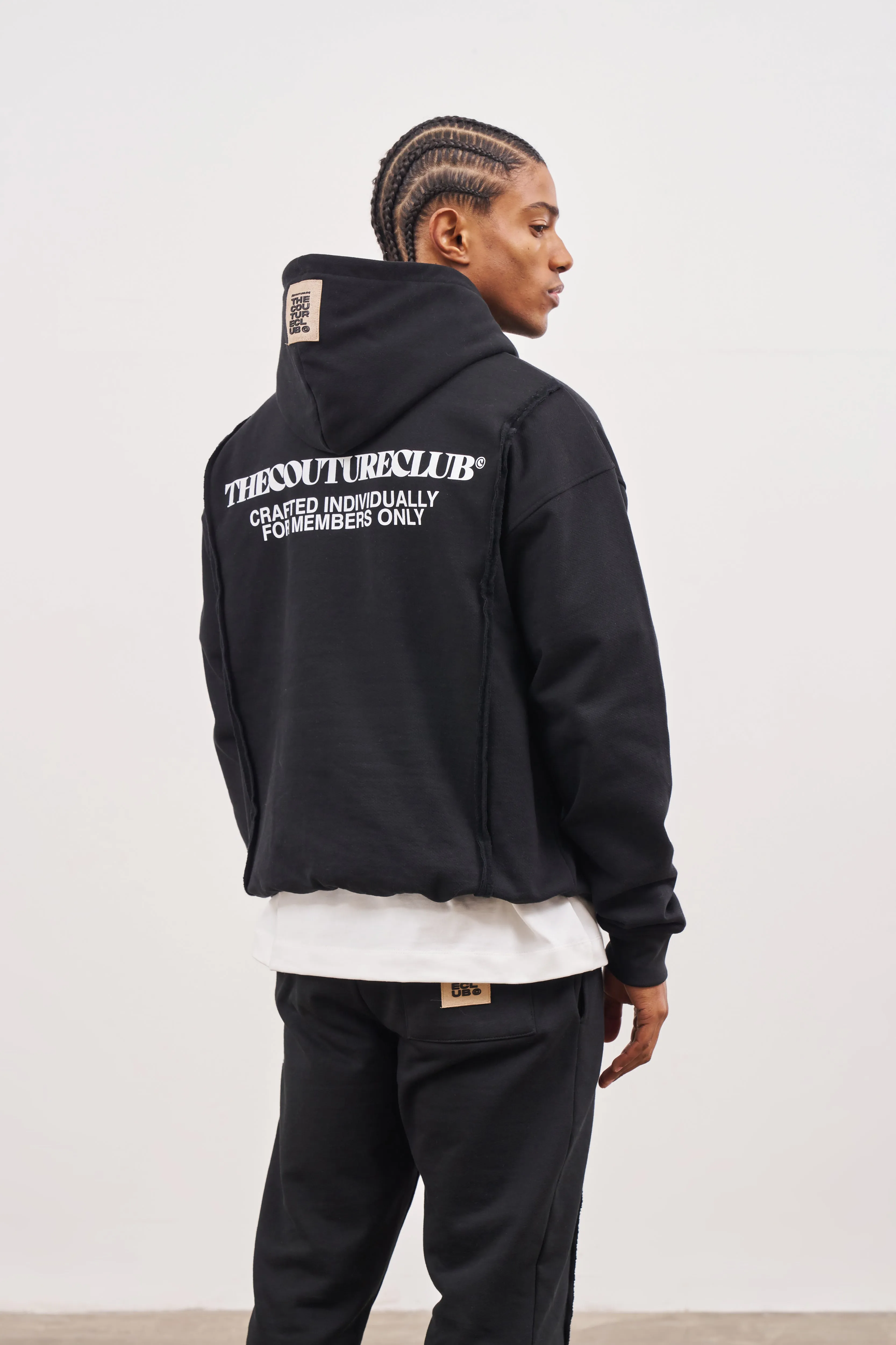 RAW SEAM QUARTER ZIP HOODIE - BLACK